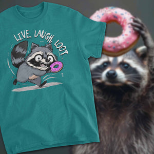 A Tshirt with a raccoon running wild carrying a donut. The words live, laugh, loot surround the raccoon.
In the background behind the tshirt, a raccoon holds aloft a pink glazed donut with sprinkles.