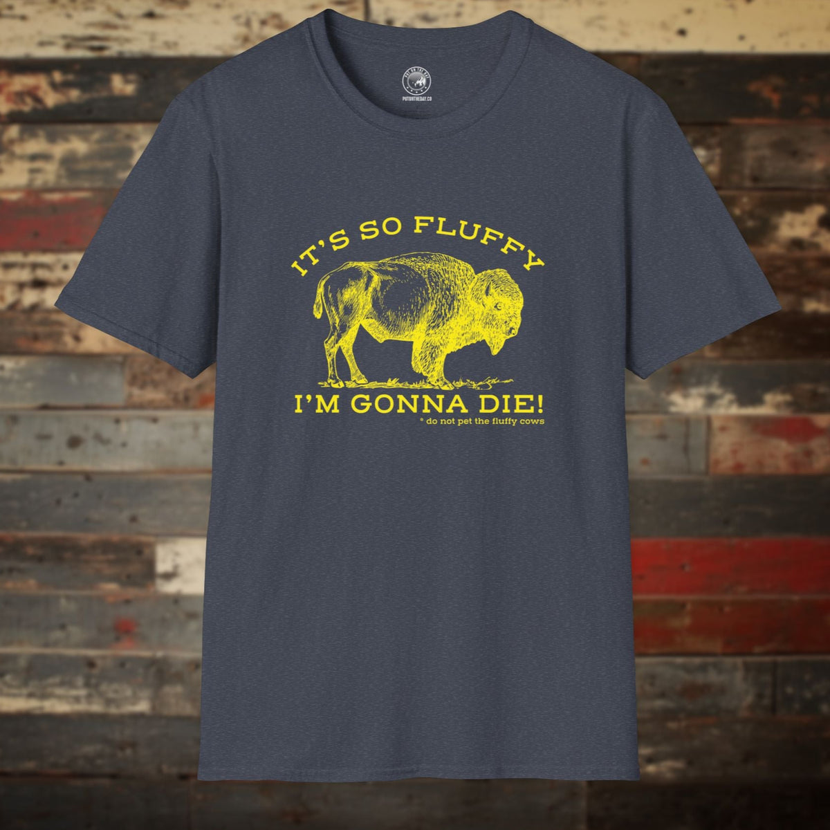 Unisex “It’s So Fluffy I’m Gonna Die” bison t-shirt in heather navy, shown flat with bold yellow lettering