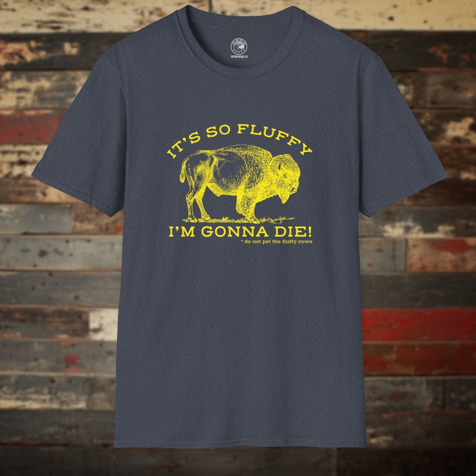 Unisex “It’s So Fluffy I’m Gonna Die” bison t-shirt in heather navy, shown flat with bold yellow lettering