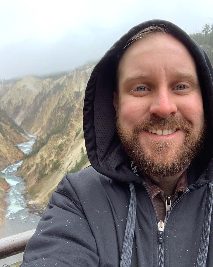Here I am at the brink of the Lower Falls of the Yellowstone River!